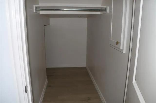 a kitchen with stainless steel appliances a sink a stove and a refrigerator