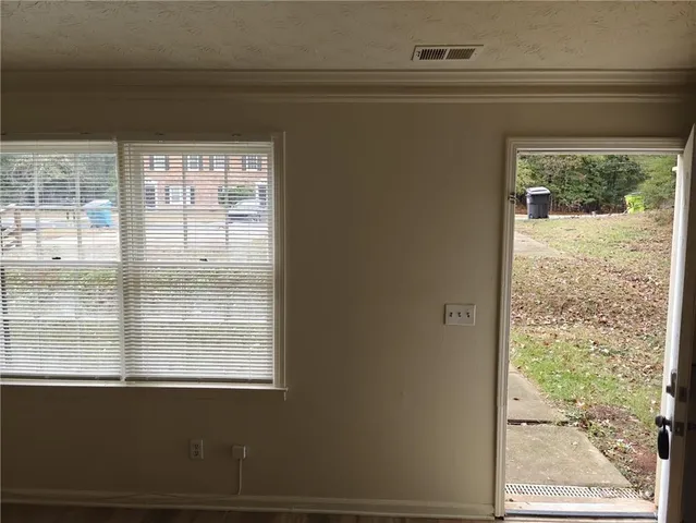 a view of a window in an empty room