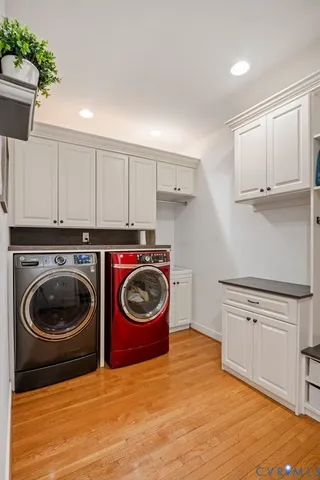 a white toilet sitting next to a shower