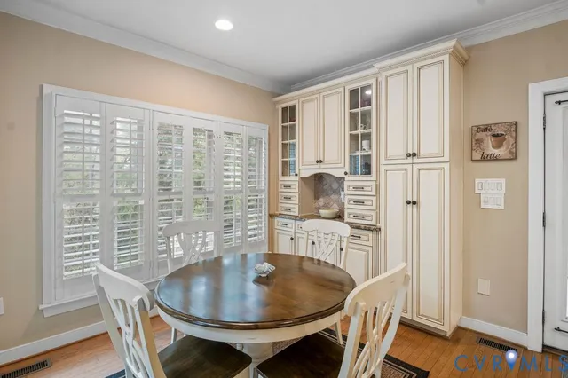 a spacious bedroom with a bed and a couch