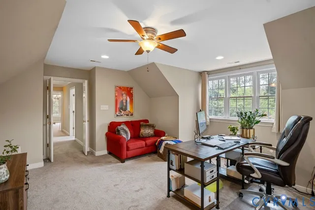 a view of a patio with dining table and chairs with wooden floor and fence