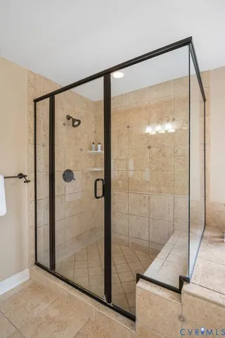 an aerial view of a house with outdoor space