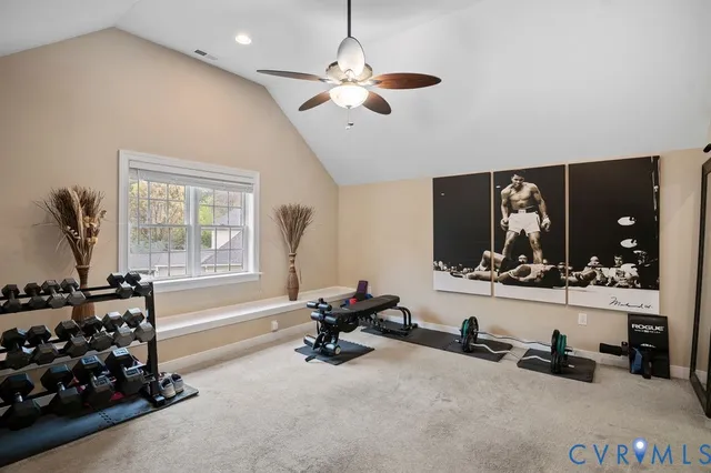 an aerial view of a house with garden space and street view