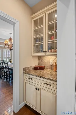 a kitchen with stainless steel appliances granite countertop a refrigerator sink and stove