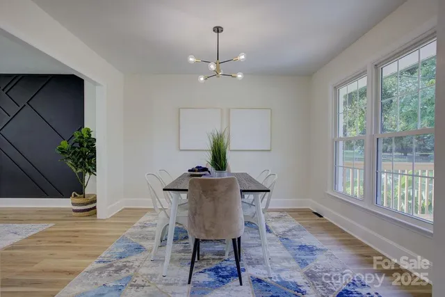 a workspace with furniture window and wooden floor