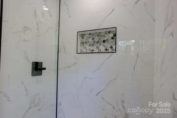 a view of a bathroom with a shower