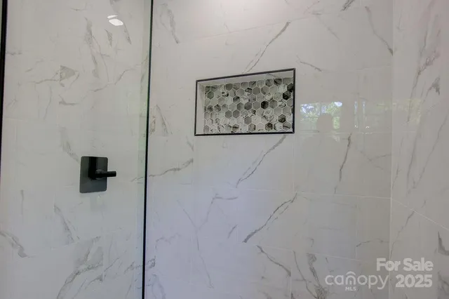 a view of a bathroom with a shower