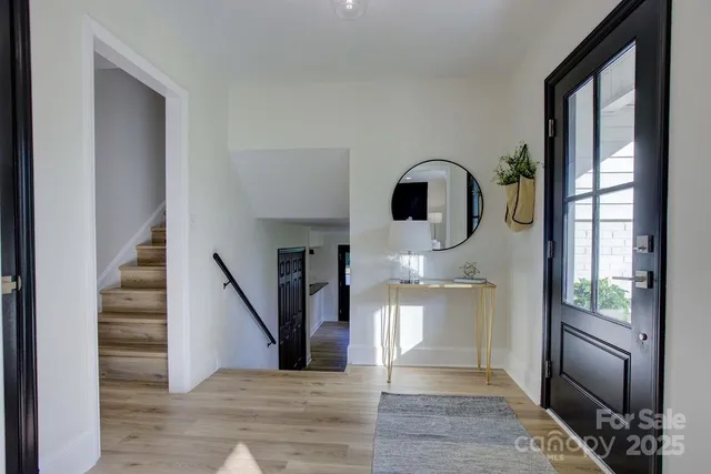 a view of a bathroom from the hallway