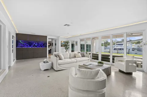 a kitchen with stainless steel appliances a sink a stove and a refrigerator