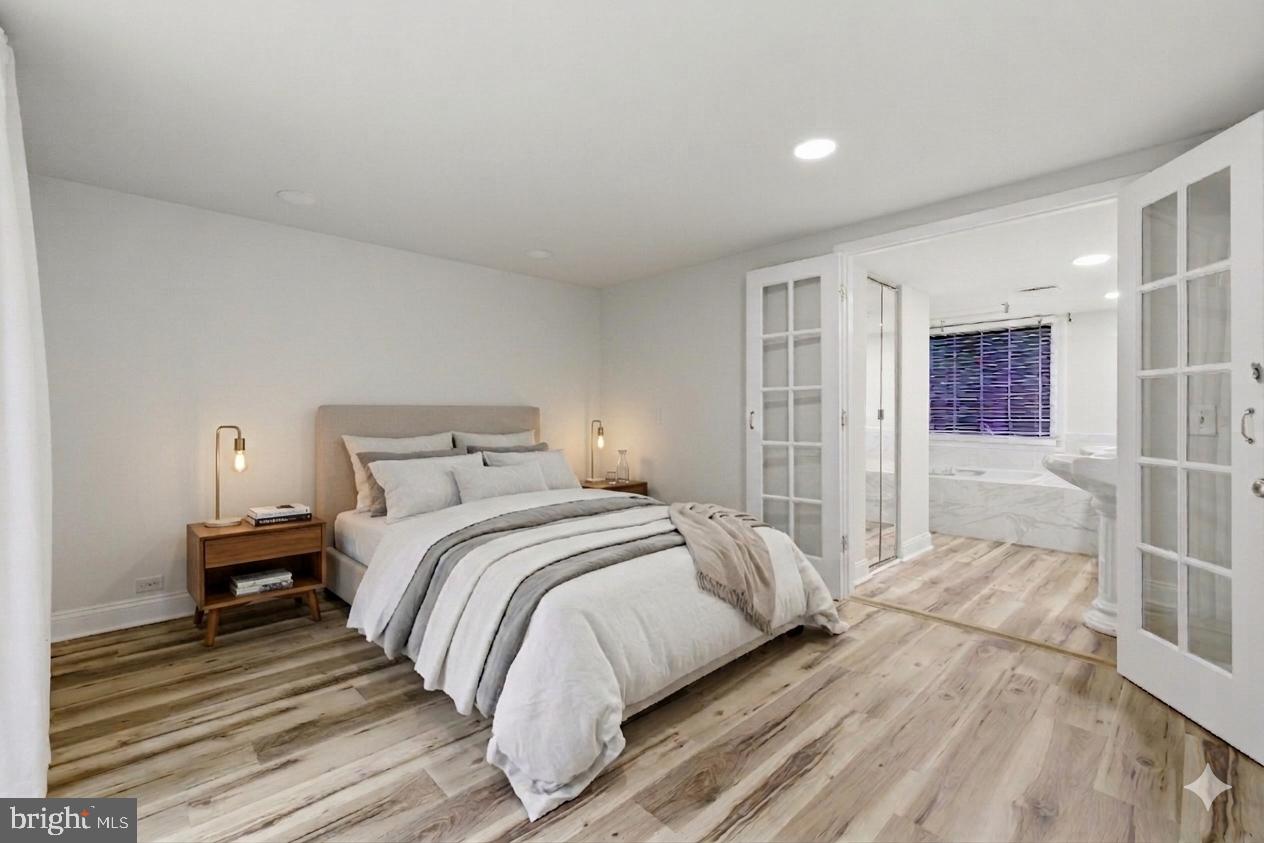 11492 Rawhide Road Lusby, MD 20657 - Photo 7 of 20 Serene bedroom with natural light.