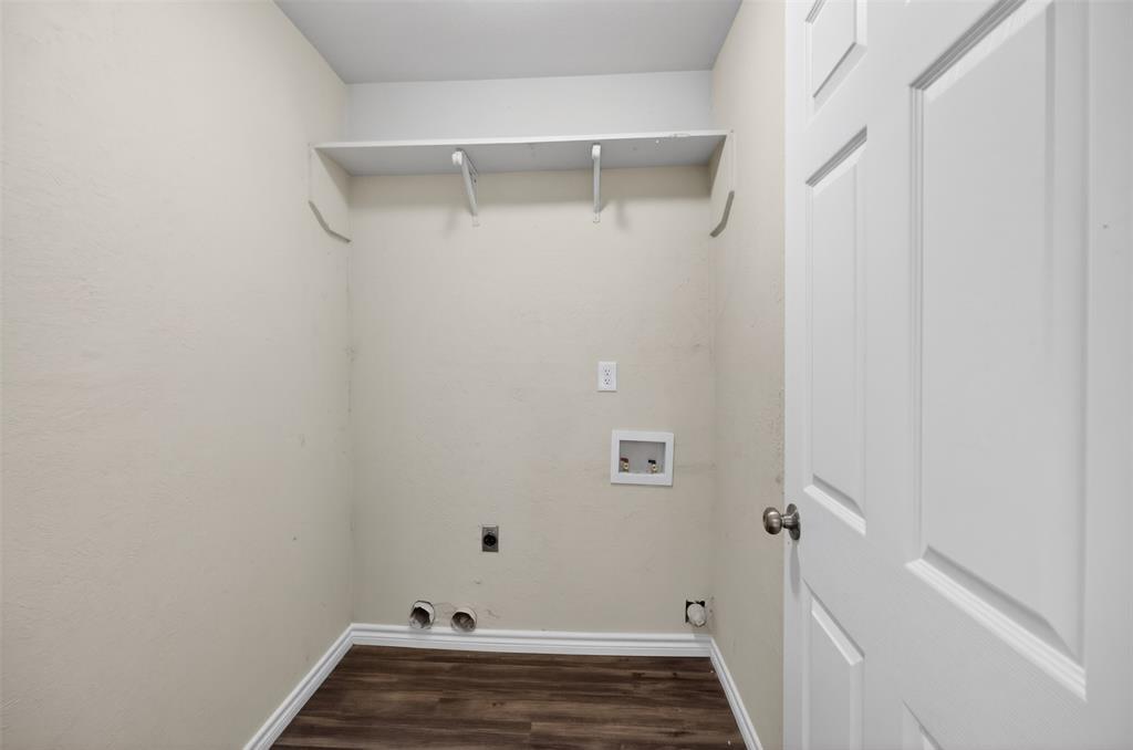 7528 Meadowlark Lane North Watauga, TX 76148 - Photo 25 of 31 a view of a room with wooden floor