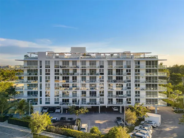 a view of a building with a garden
