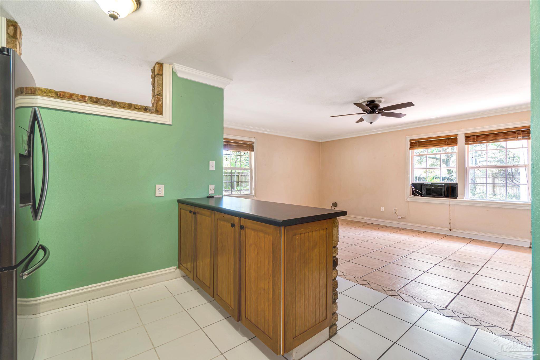 1961 Guseman Road Gulf Breeze, FL 32563 - Photo 9 of 37 a view of kitchen with windows and sink