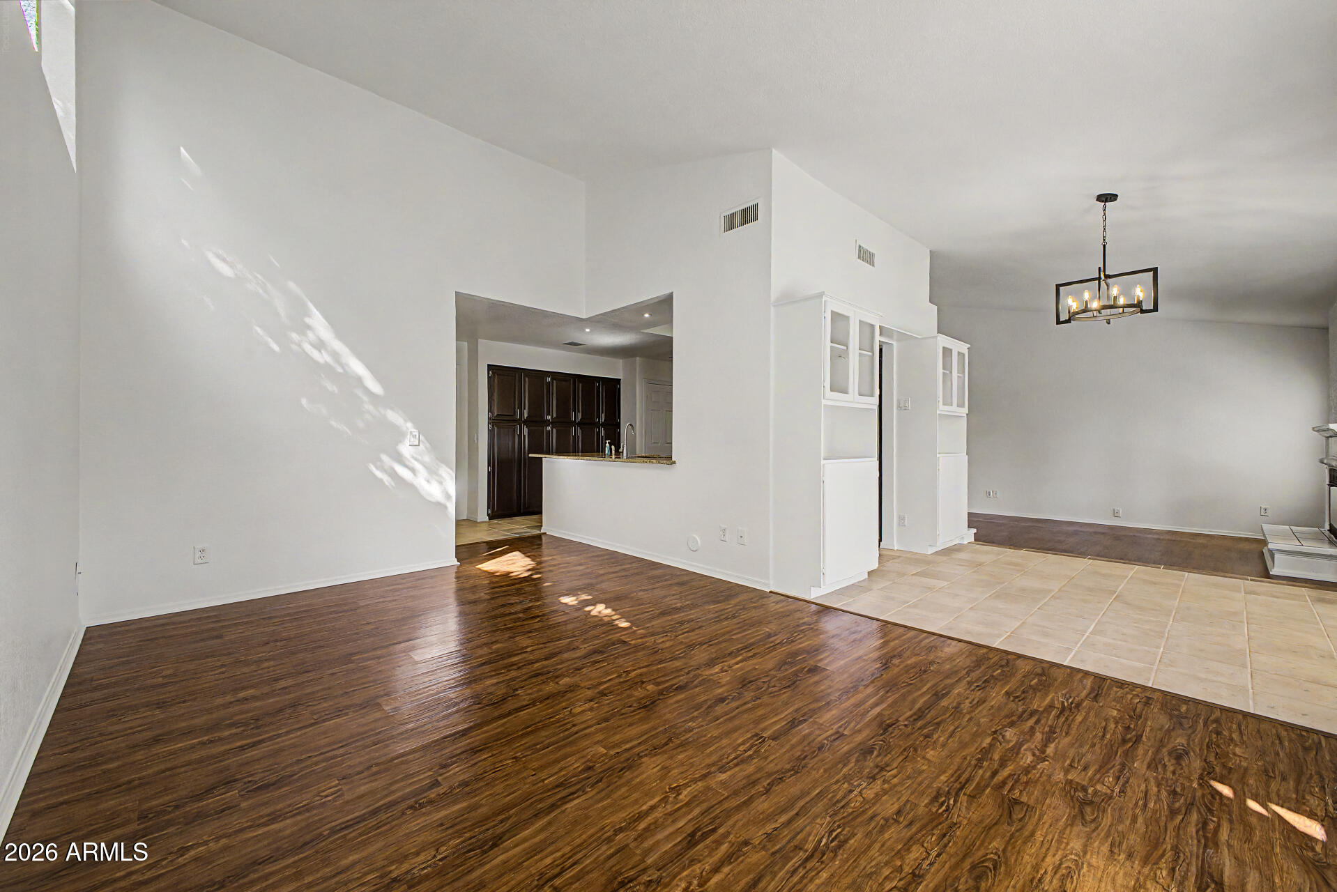 6725 West Utopia Road Glendale, AZ 85308 - Photo 5 of 27 a view of empty room with wooden floor