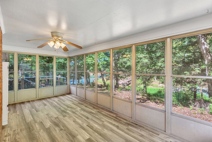 106 Pikes Ridge Anderson, SC 29626 - Photo 25 of 41 Walls of windows framing lush wooded views define this versatile sunroom space.