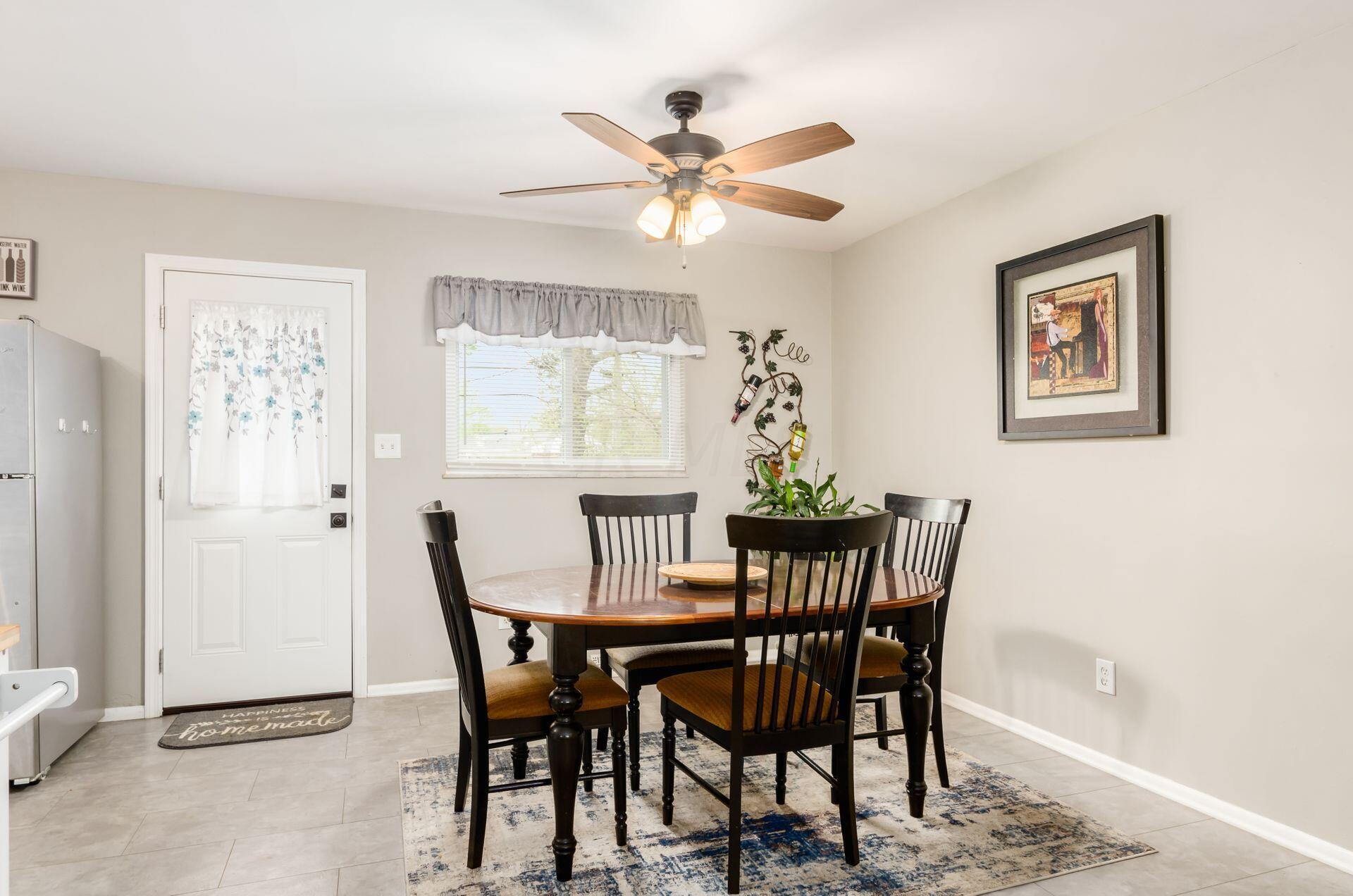 5488 Darcy Road Columbus, OH 43229 - Photo 16 of 48 Dining area with new window and rear door.
