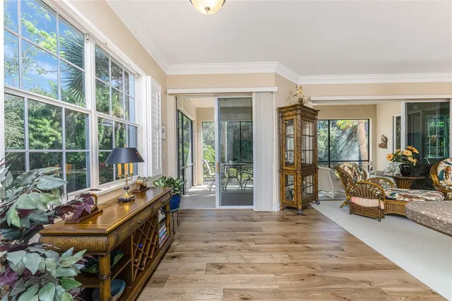 a kitchen with granite countertop white cabinets stainless steel appliances and a sink