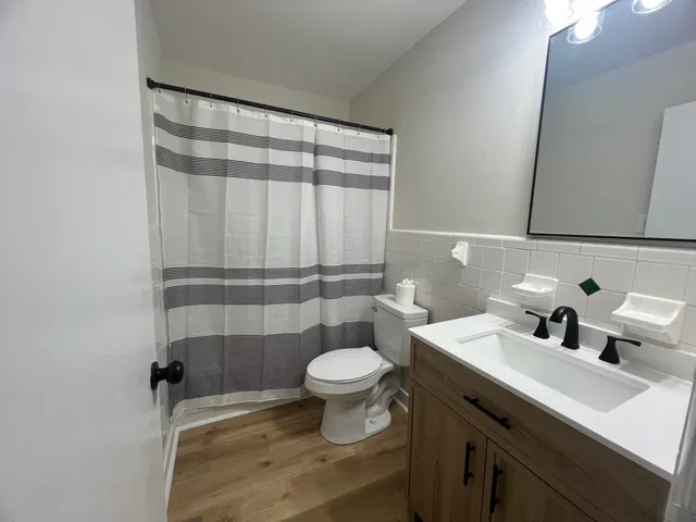 a bathroom with a sink and a toilet