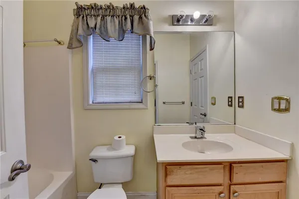 a bathroom with a sink and a toilet