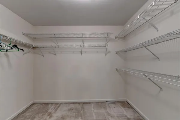 a view of a room with racks on the wall