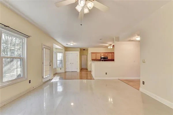 a view of a room with window and cabinet