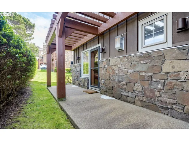 view of house with backyard