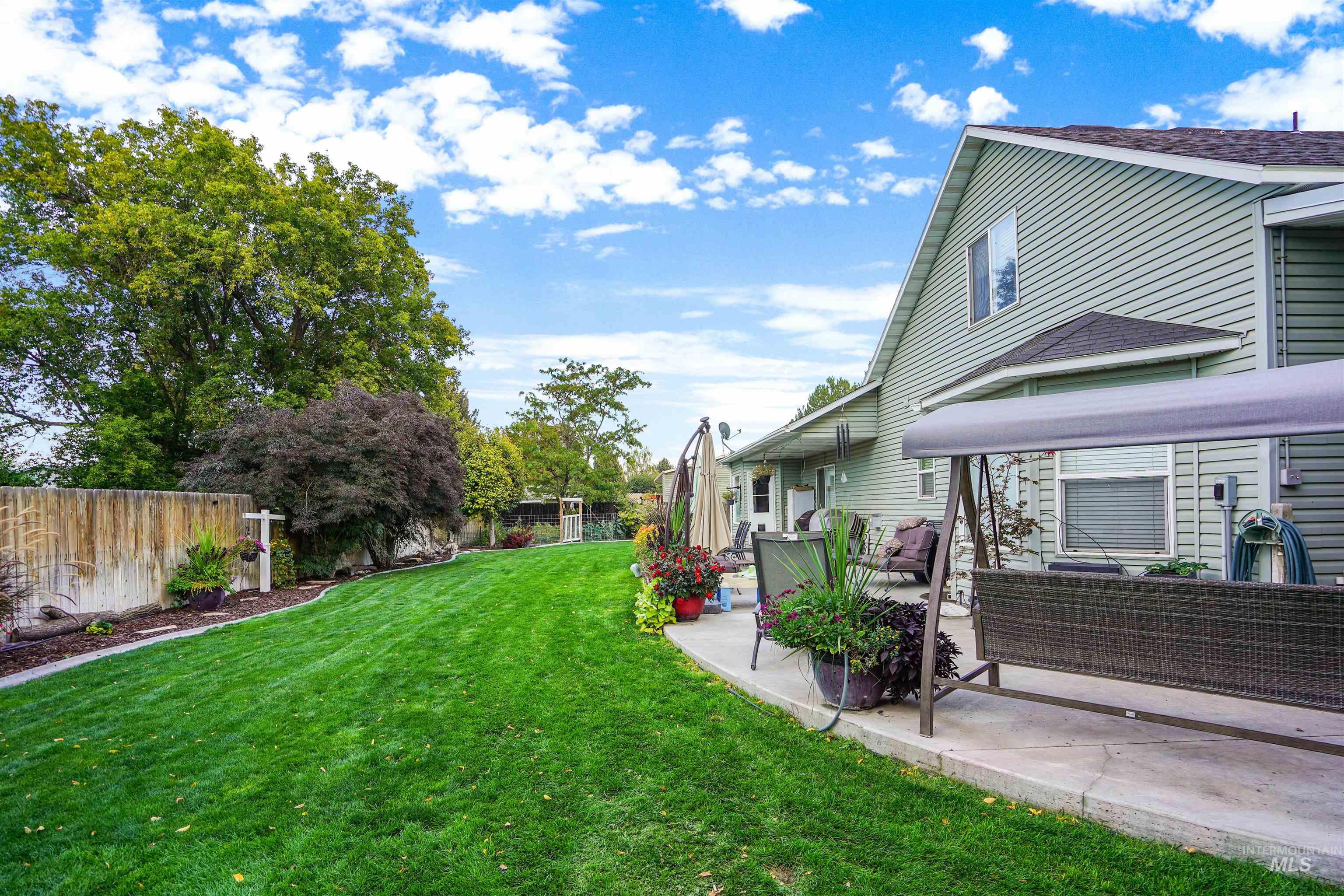 500 East 19th Street Burley, ID 83318 - Photo 26 of 31 Fenced backyard featuring outdoor lounge area and a patio