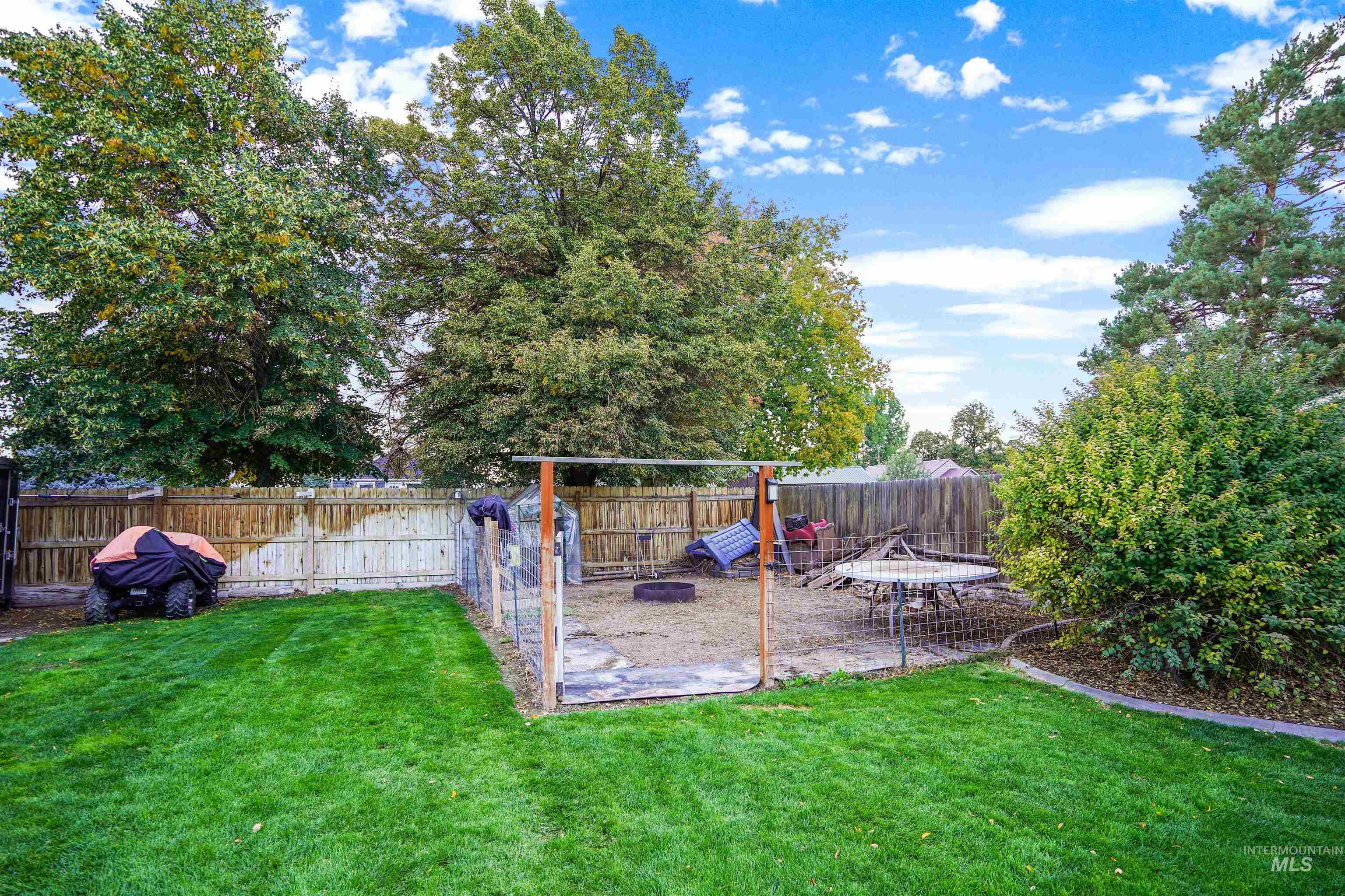 500 East 19th Street Burley, ID 83318 - Photo 28 of 31 Fenced backyard with a patio area