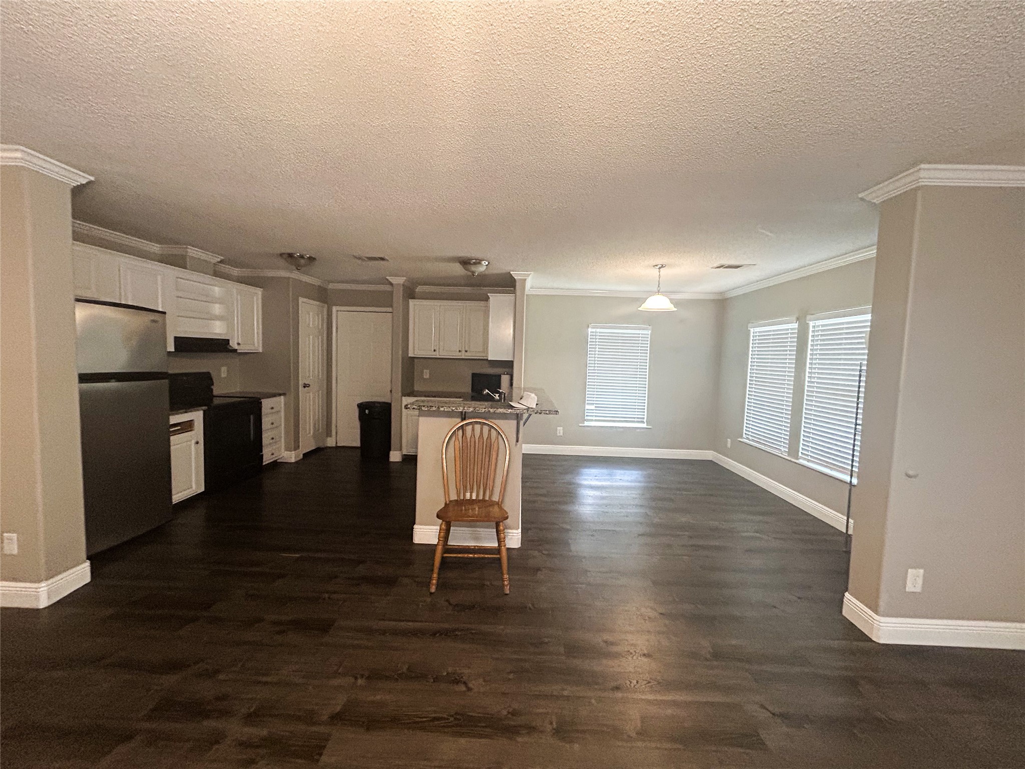 113 Varsity Circle Huntsville, TX 77340 - Photo 3 of 16 a view of kitchen with cabinets and stainless steel appliances