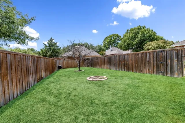 a view of a backyard with a garden