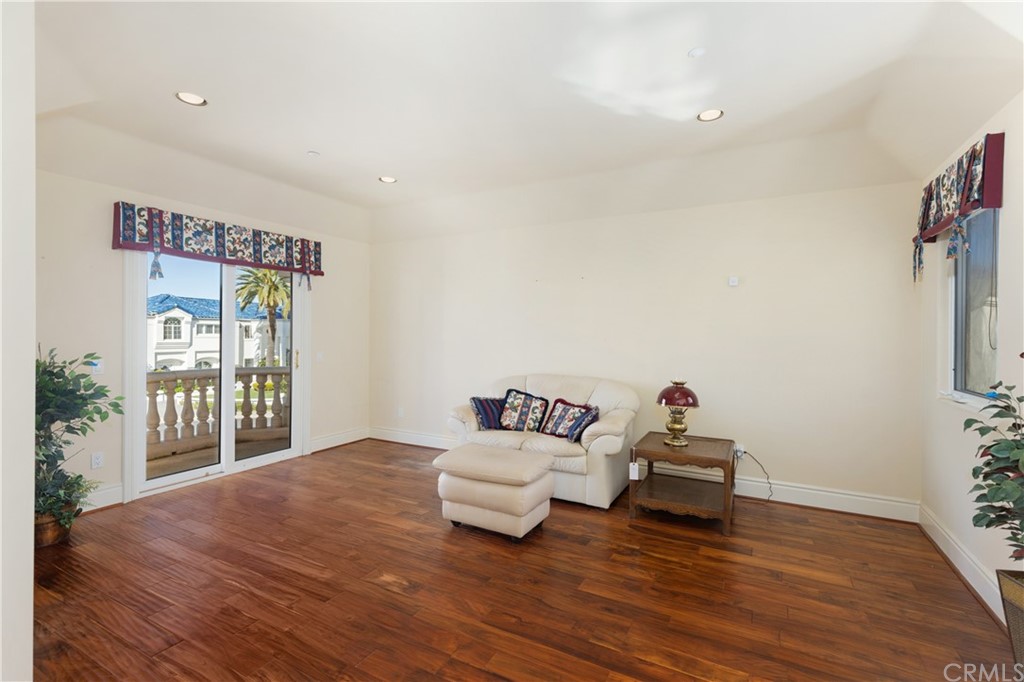 2 Crystal View Ridge Laguna Niguel, CA 92677 - Photo 32 of 50 a living room with furniture and wooden floor