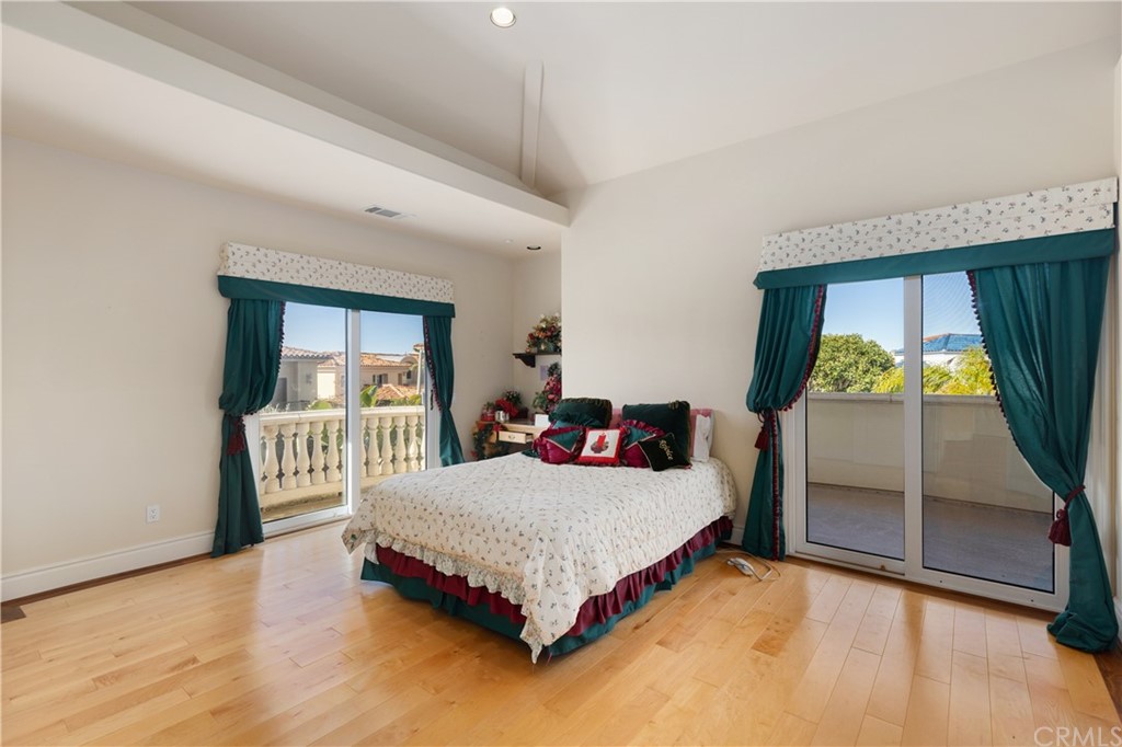 2 Crystal View Ridge Laguna Niguel, CA 92677 - Photo 37 of 50 a bedroom with a bed and a window