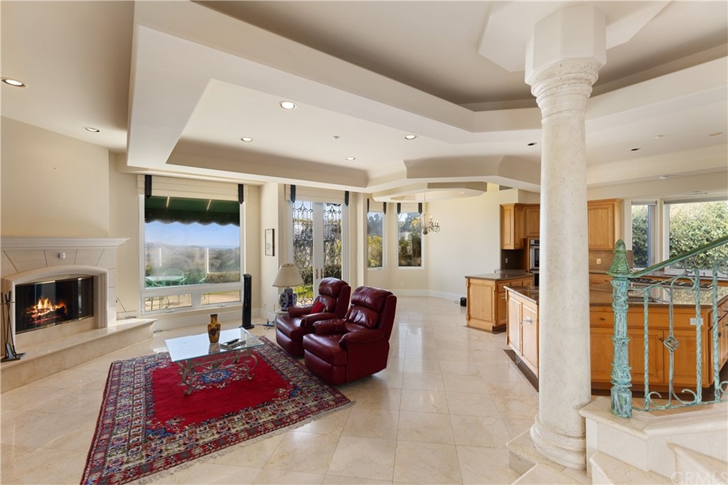 2 Crystal View Ridge Laguna Niguel, CA 92677 - Photo 9 of 50 a living room with furniture large window and a fireplace