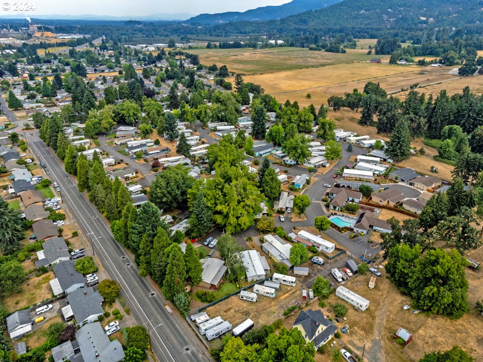 1125 58th Street, Unit 35 Springfield, OR 97478 - Photo 3 of 15 an aerial view of residential houses with outdoor space and river