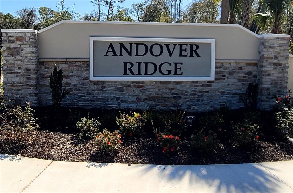 1701 Andover Rdg Drive DeLand, FL 32720 - Photo 11 of 14 a sign that is sitting in front of a house
