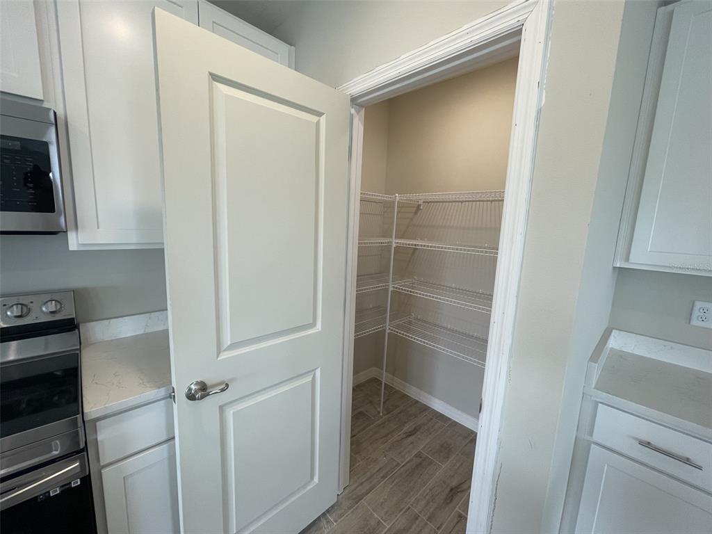 1701 Andover Rdg Drive DeLand, FL 32720 - Photo 6 of 14 a view of a walk in closet