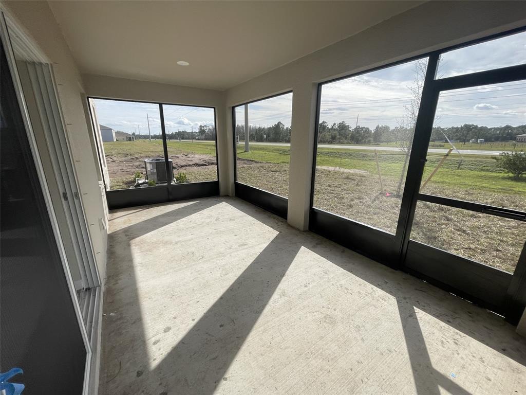 1701 Andover Rdg Drive DeLand, FL 32720 - Photo 10 of 14 a view of a large window with an outdoor space