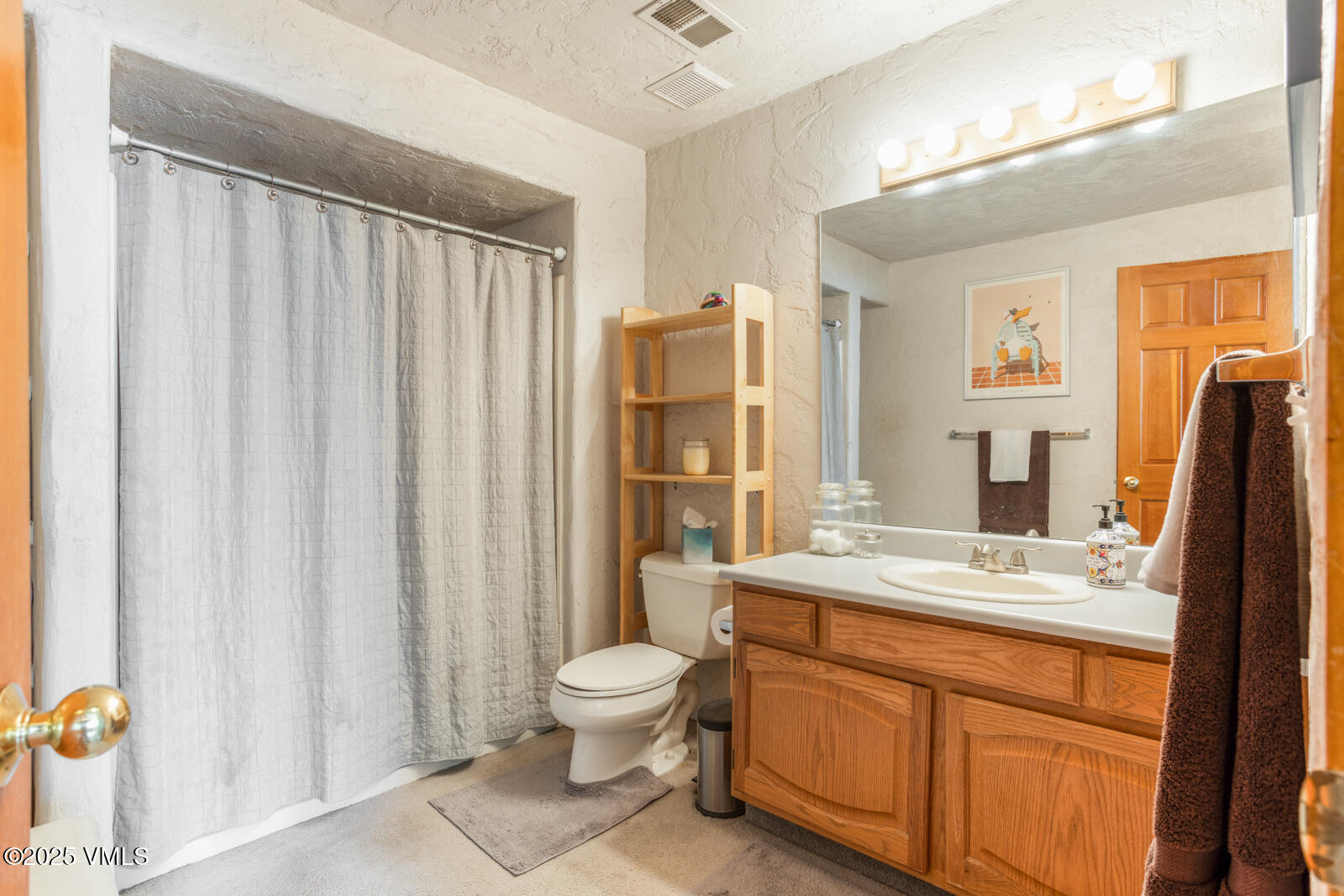 20 Hereford Road Edwards, CO 81632 - Photo 24 of 32 a bathroom with a granite countertop sink toilet and shower