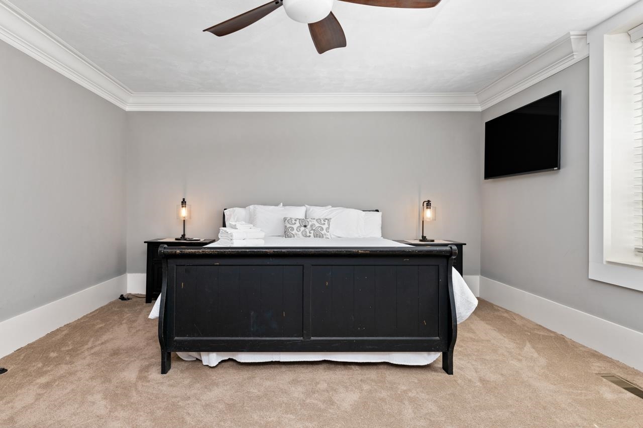 187 Todd Road Mount Sidney, VA 24467 - Photo 21 of 53 a bed sitting in a room next to a window