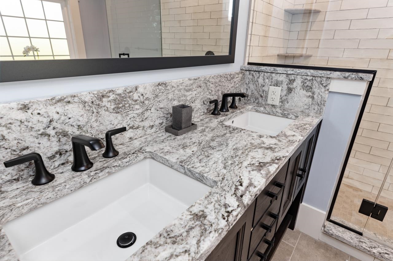 187 Todd Road Mount Sidney, VA 24467 - Photo 35 of 53 a bathroom with a granite countertop sink and a mirror