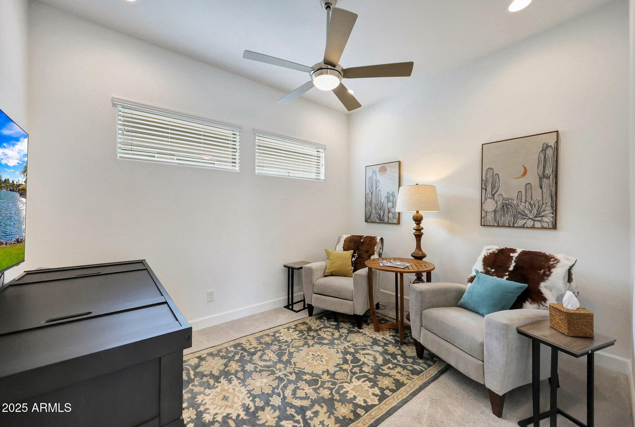 20771 West Colter Street Buckeye, AZ 85396 - Photo 20 of 44 a living room with furniture and a rug
