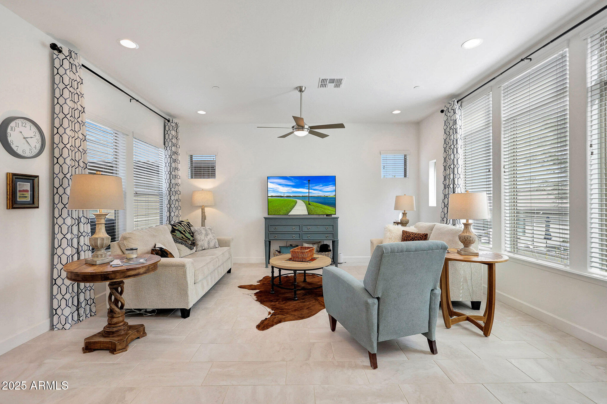 20771 West Colter Street Buckeye, AZ 85396 - Photo 6 of 44 a living room with furniture and a window