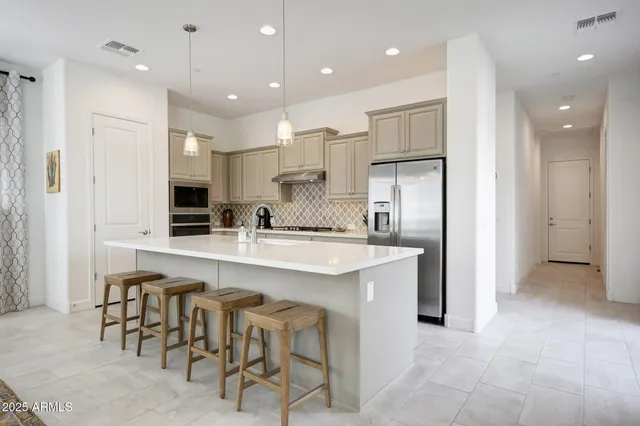 a kitchen with counter space cabinets and appliances