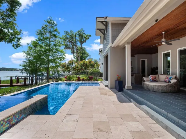 a kitchen with a table and chairs