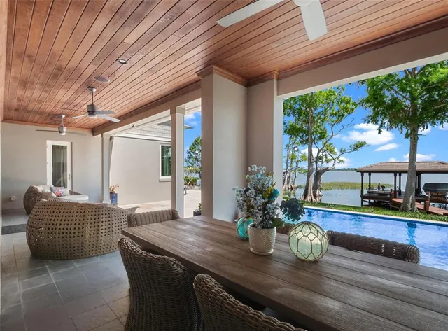a kitchen with stainless steel appliances granite countertop a sink and a stove