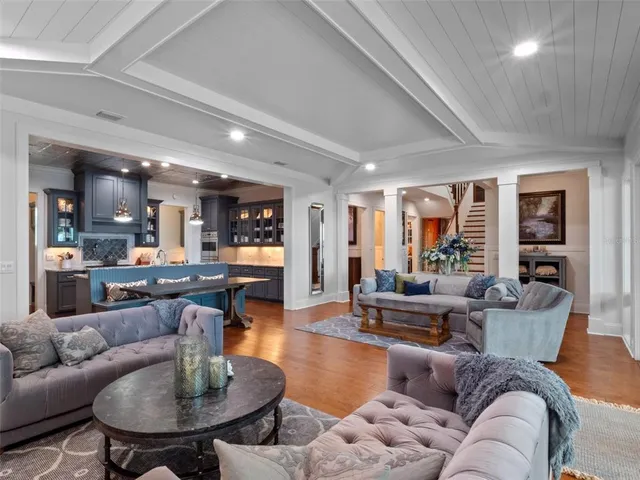 a view of entryway with wooden floor and stairs