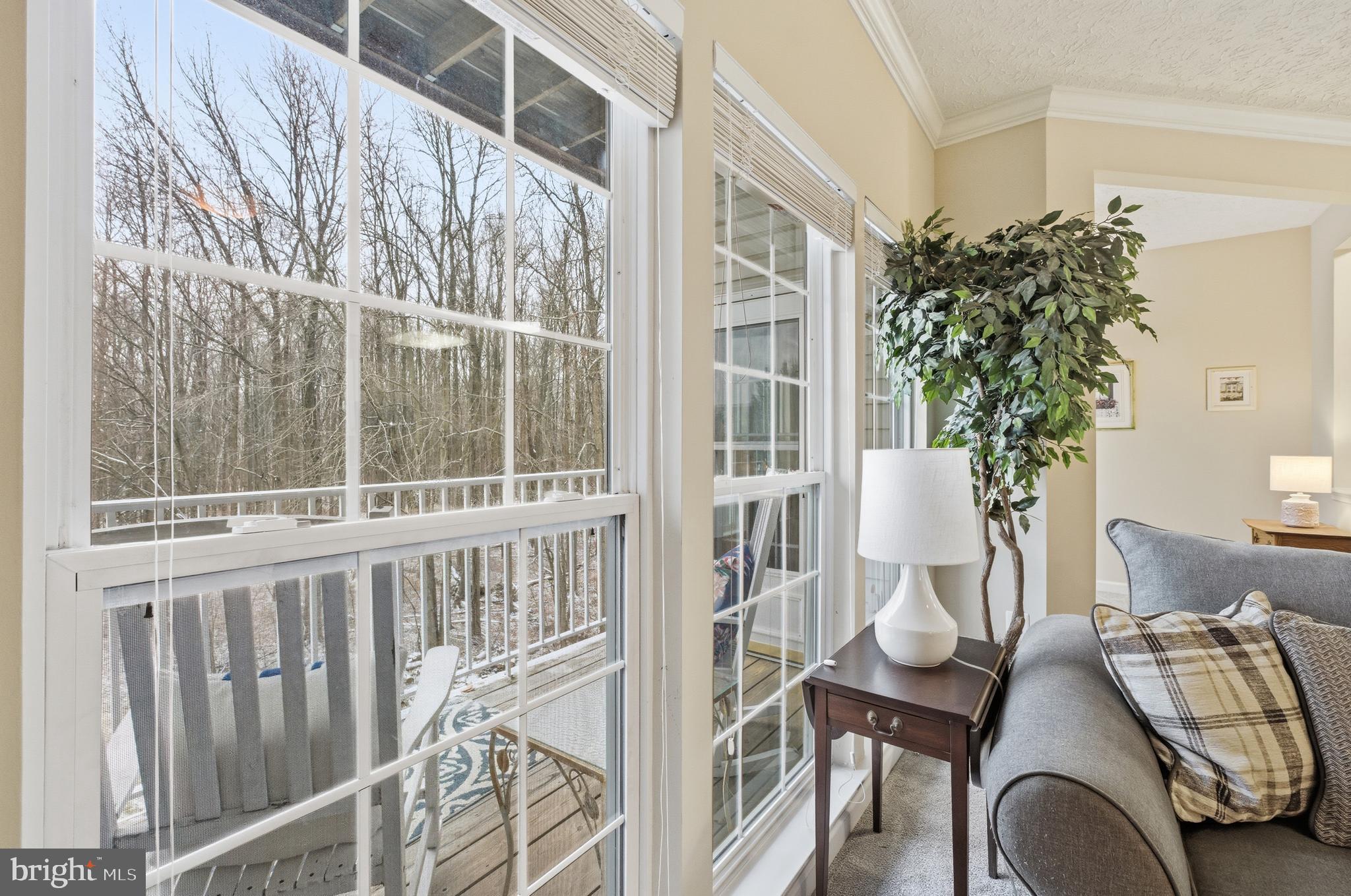 9613 Haven Farm Road, Unit 9613G Perry Hall, MD 21128 - Photo 11 of 37 a balcony with table and chairs