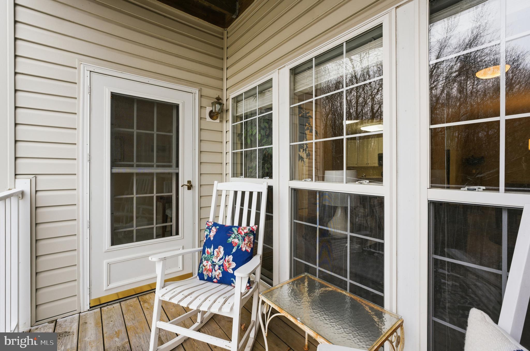 9613 Haven Farm Road, Unit 9613G Perry Hall, MD 21128 - Photo 12 of 37 a view of chair in the balcony