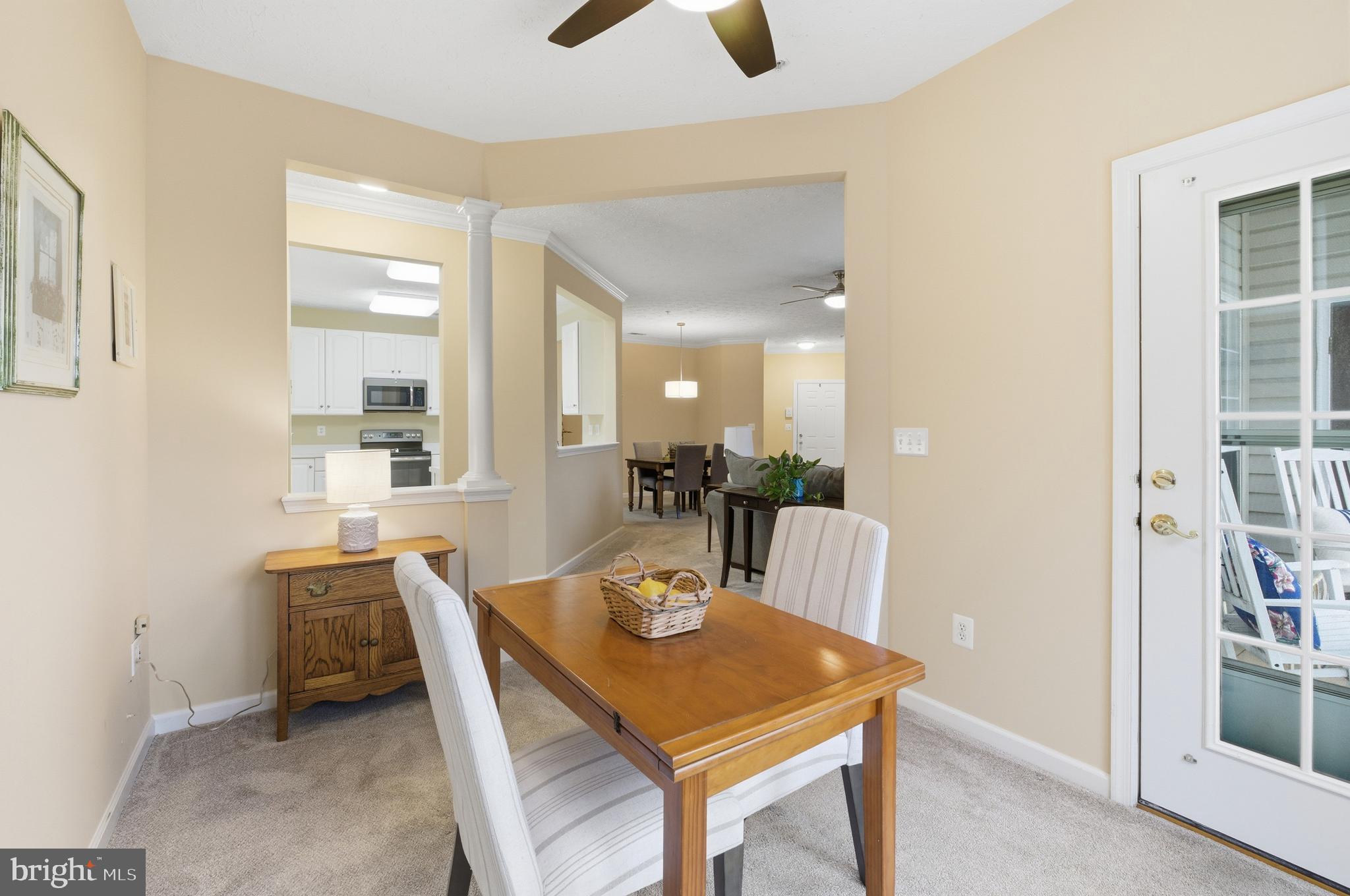 9613 Haven Farm Road, Unit 9613G Perry Hall, MD 21128 - Photo 16 of 37 a dining room with furniture and window