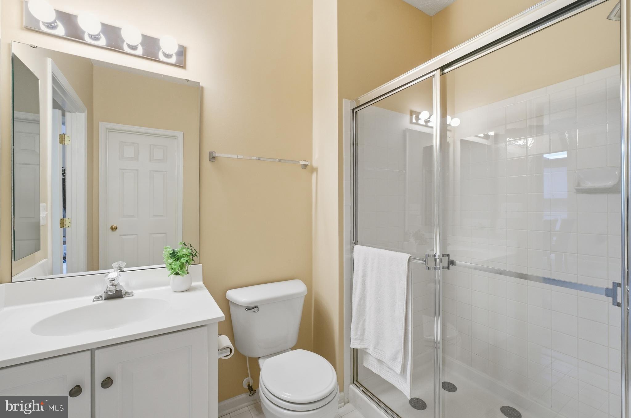 9613 Haven Farm Road, Unit 9613G Perry Hall, MD 21128 - Photo 29 of 37 a bathroom with a sink toilet and shower